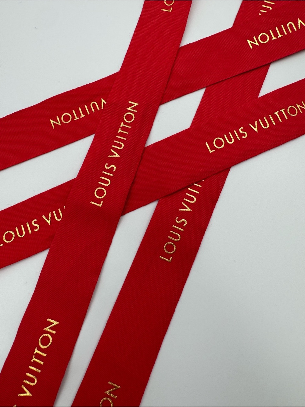 Louis Vuitton Red Ribbon with Gold Lettering